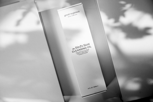 The Bird’s Nest Cleansing Oil by Good Regimen Skin Company displayed in soft shadow, highlighting a gentle first cleanse for makeup, sunscreen, and daily buildup.