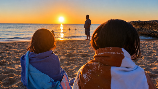 Beach sunset scene representing summer skincare after sun exposure, sunscreen, ocean water, sweat, and outdoor activity with Good Regimen Bird’s Nest skincare.