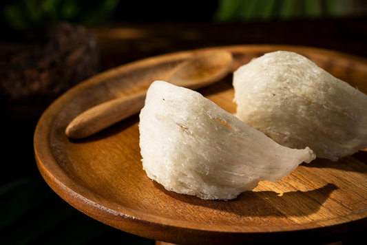 White Bird’s Nest skincare ingredient on a wooden plate, used in Good Regimen formulas for nourishing, hydrating, and skin-conditioning benefits.