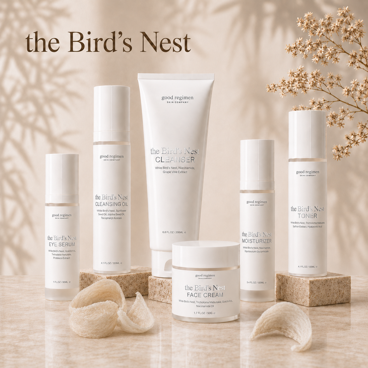 The Bird’s Nest Collection by Good Regimen Skin Company featuring cleansing oil, cleanser, toner, eye serum, moisturizer, and face cream with real White Bird’s Nest accents on a luxury marble display for hydrated, radiant, healthy-looking skin.