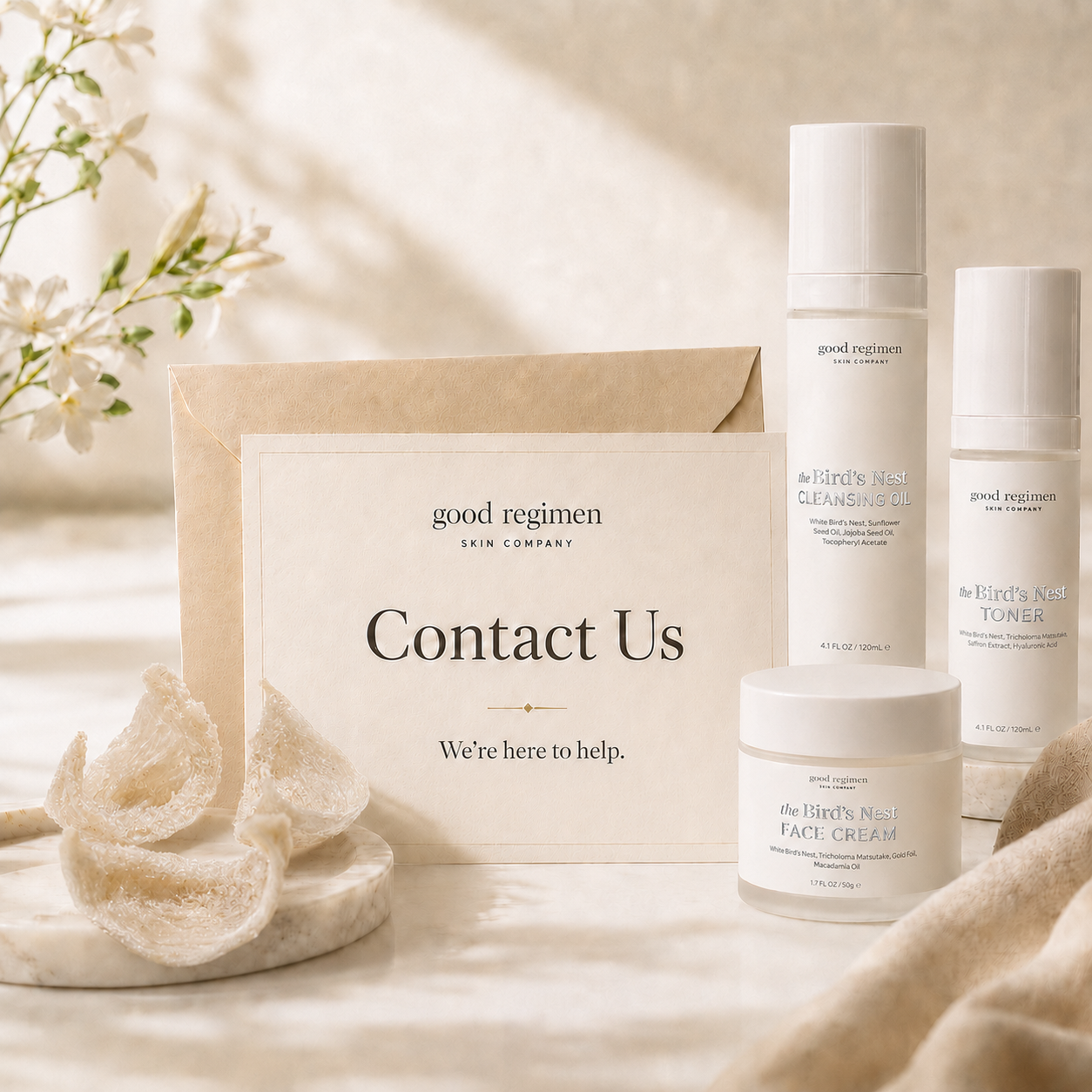 Good Regimen Skin Company Contact Us page image featuring The Bird’s Nest Cleansing Oil, Toner, and Face Cream with White Bird’s Nest ingredient pieces, soft neutral skincare styling, and a welcoming contact card that says “Contact Us” and “We’re here to help.”